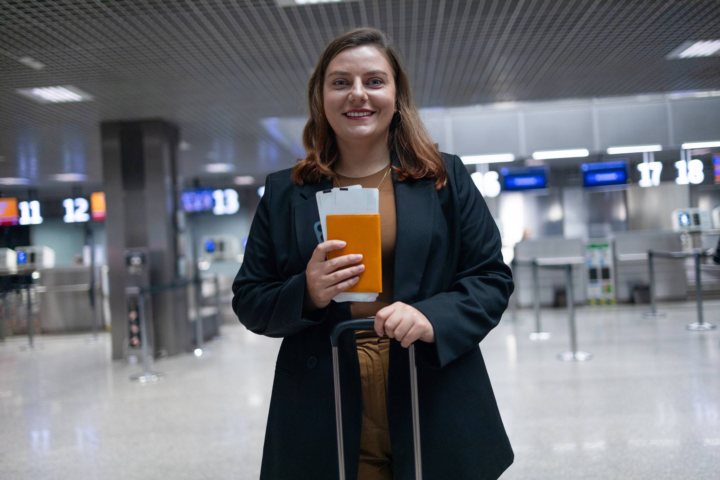 Smiling Business Woman Going On Business Trip Carrying