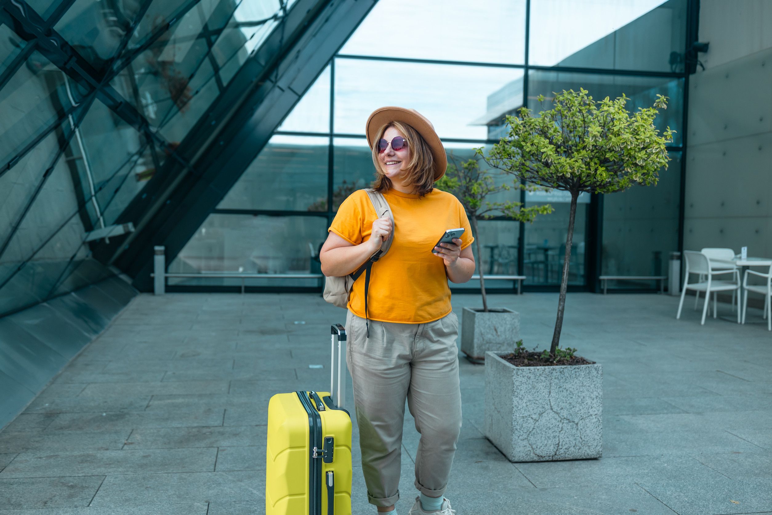 Young Caucasian Female Passenger In Stylish Casual Clothes